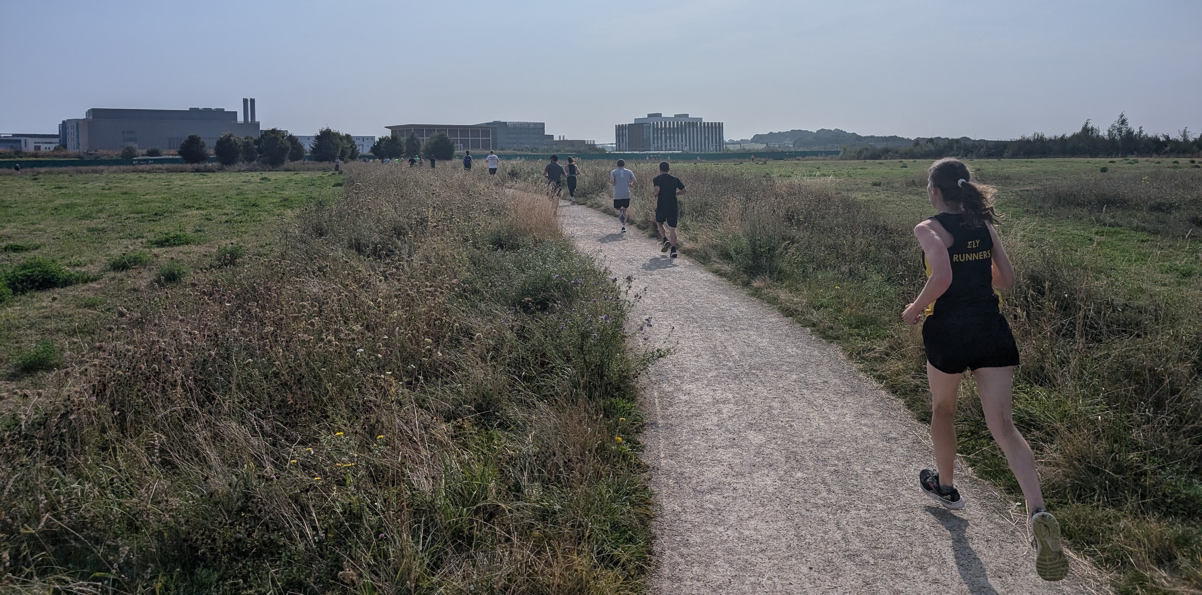 Runners in Hobson's Park near the Biomedical Campus