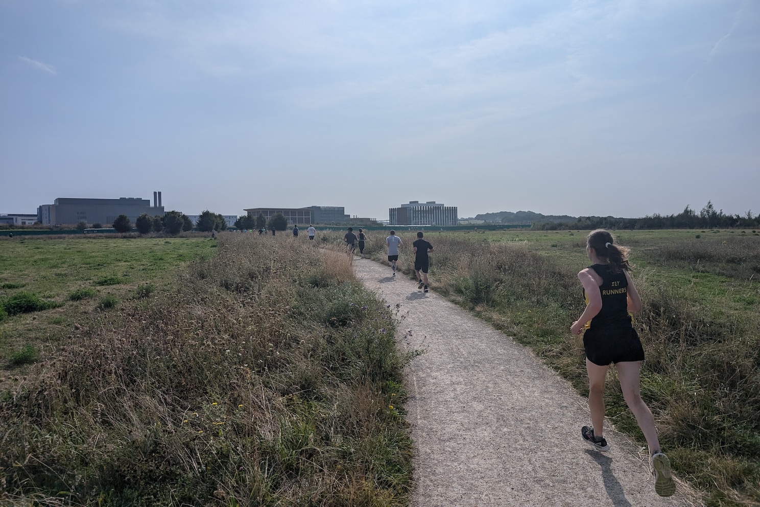 Runners in Hobson's Park near the Biomedical Campus