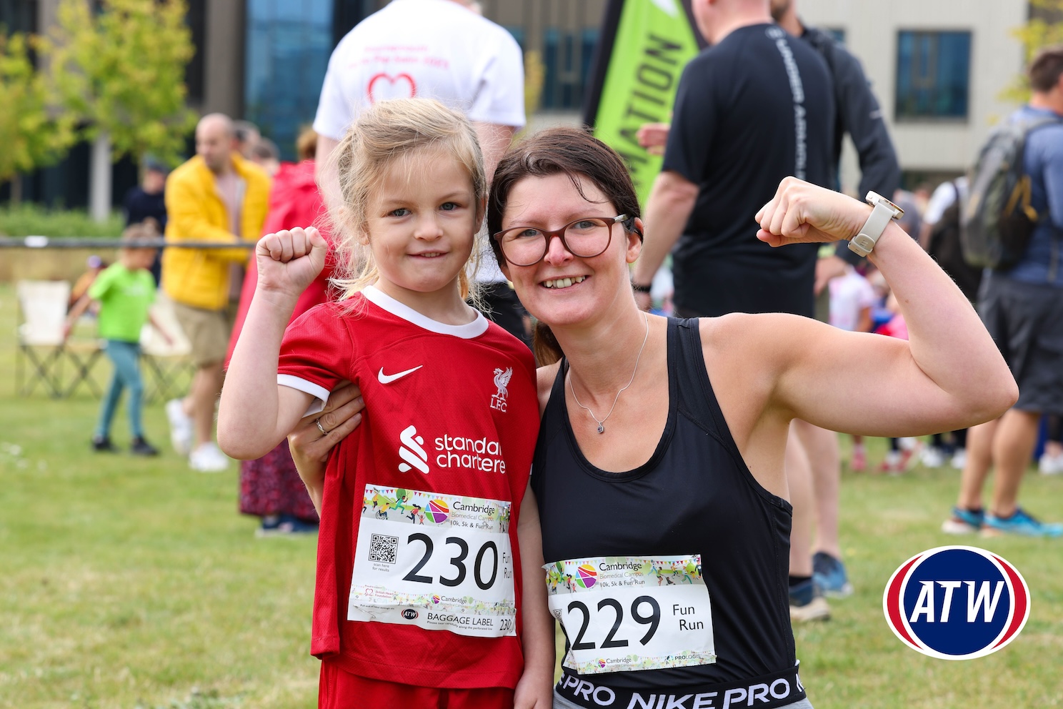 A girl and woman ready to race