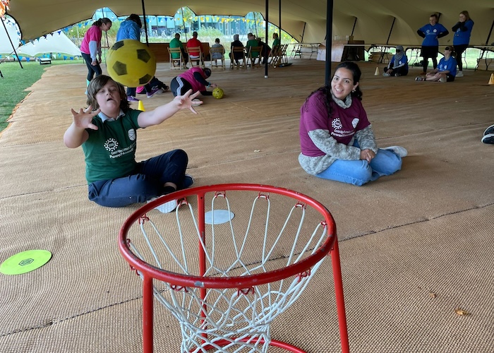 PowerHouseGames child throws a ball at a hoop